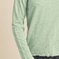 Mint green Lettuce Hemline Round Neck Raglan Sleeve T-Shirt, featuring a frilly hem and relaxed fit, perfect for casual outfits.