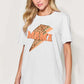 Woman wearing MAMA round-neck short sleeve T-shirt with leopard print lightning bolt design, casual style, full size.