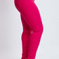 Bright pink Hyperstretch Mid-Rise Skinny Jeans by YMI Jeans, showcasing ultra-stretchy fabric, mid-rise waist, and sleek skinny leg design.