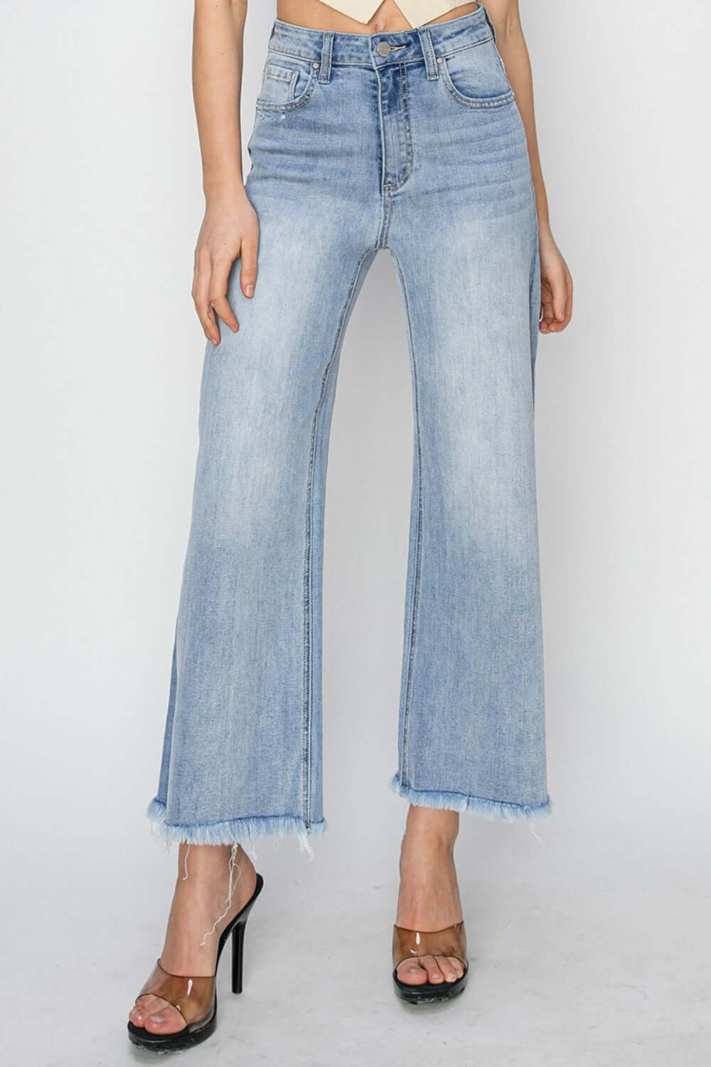 High rise crop wide fray hem jeans with a trendy wide leg style for a modern and edgy look.