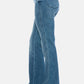 Stylish Judy Blue full size tummy control cut hem flare jeans side view, featuring a vintage wash for a timeless and flattering silhouette.