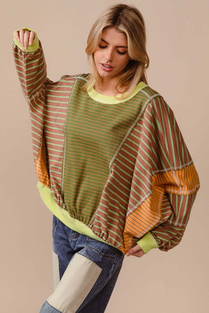 Trendy BiBi Color Block Striped Round Neck Sweatshirt in bold colors, perfect for casual outings or lounging in style.