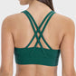 Crisscross back design of Millennia Scoop Neck Active Tank in green, perfect for stylish workouts and movement.