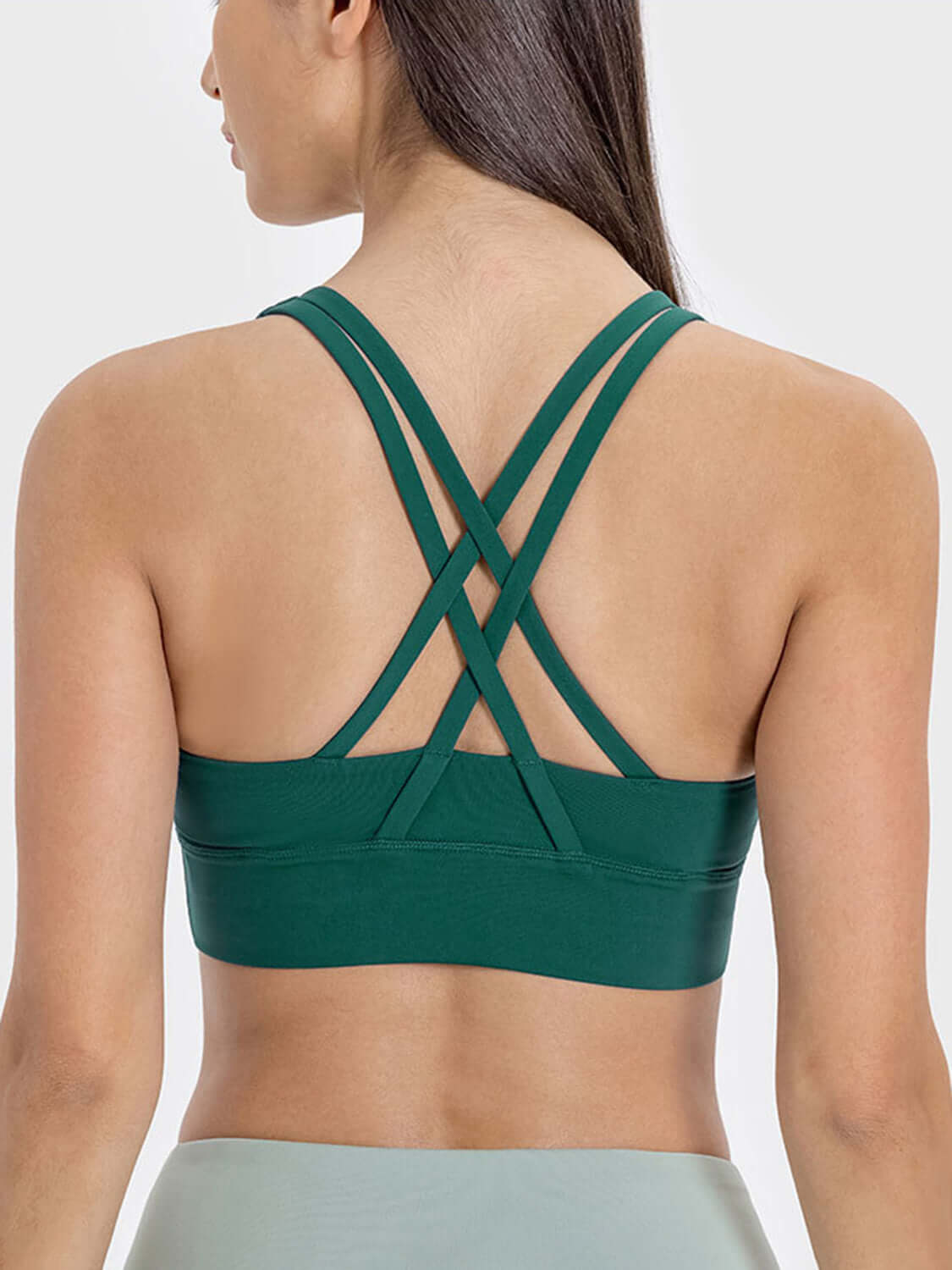 Crisscross back design of Millennia Scoop Neck Active Tank in green, perfect for stylish workouts and movement.