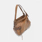 Nicole Lee USA vegan leather hobo bag with braided tassel, rhinestone embroidery, and adjustable shoulder straps. Medium-sized.