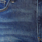 High Waist Released Hem Slit Jeans in deep indigo wash by Judy Blue Jeans showing button and pocket details.