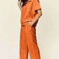 DOUBLE TAKE Full Size Texture Half Zip Short Sleeve Top and Pants Set at Bella Road