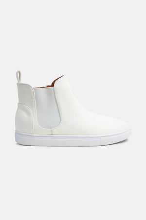 Stylish white faux suede sneakers with elastic side panels for a comfortable, trendy look. Perfect for everyday wear.