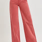 High rise tummy control wide leg jeans in coral pink, stylish and flattering fit for a trendy retro-inspired look.