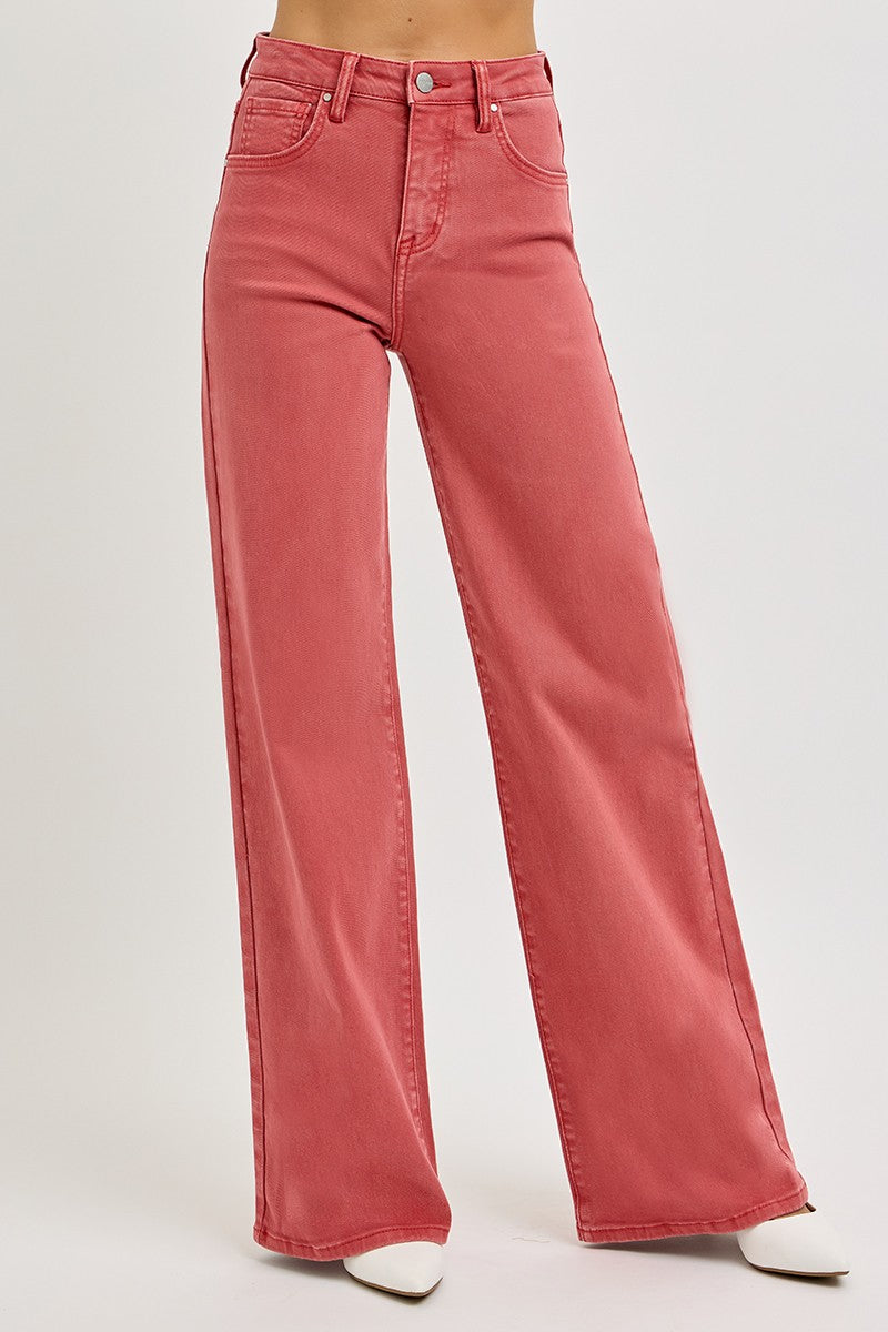 High rise tummy control wide leg jeans in coral pink, stylish and flattering fit for a trendy retro-inspired look.