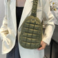 Stylish woman with Bella Road Quilted Nylon Crossbody Bag in green, perfect for trendy outfits and everyday adventures.