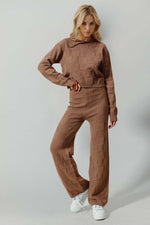 Woman wearing a stylish brown Double Take Checkered Round Neck Top and Pants Set with sneakers, perfect for leisure wear.