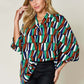 DOUBLE TAKE Full Size Geometric Notched Raglan Sleeve Blouse at Bella Road