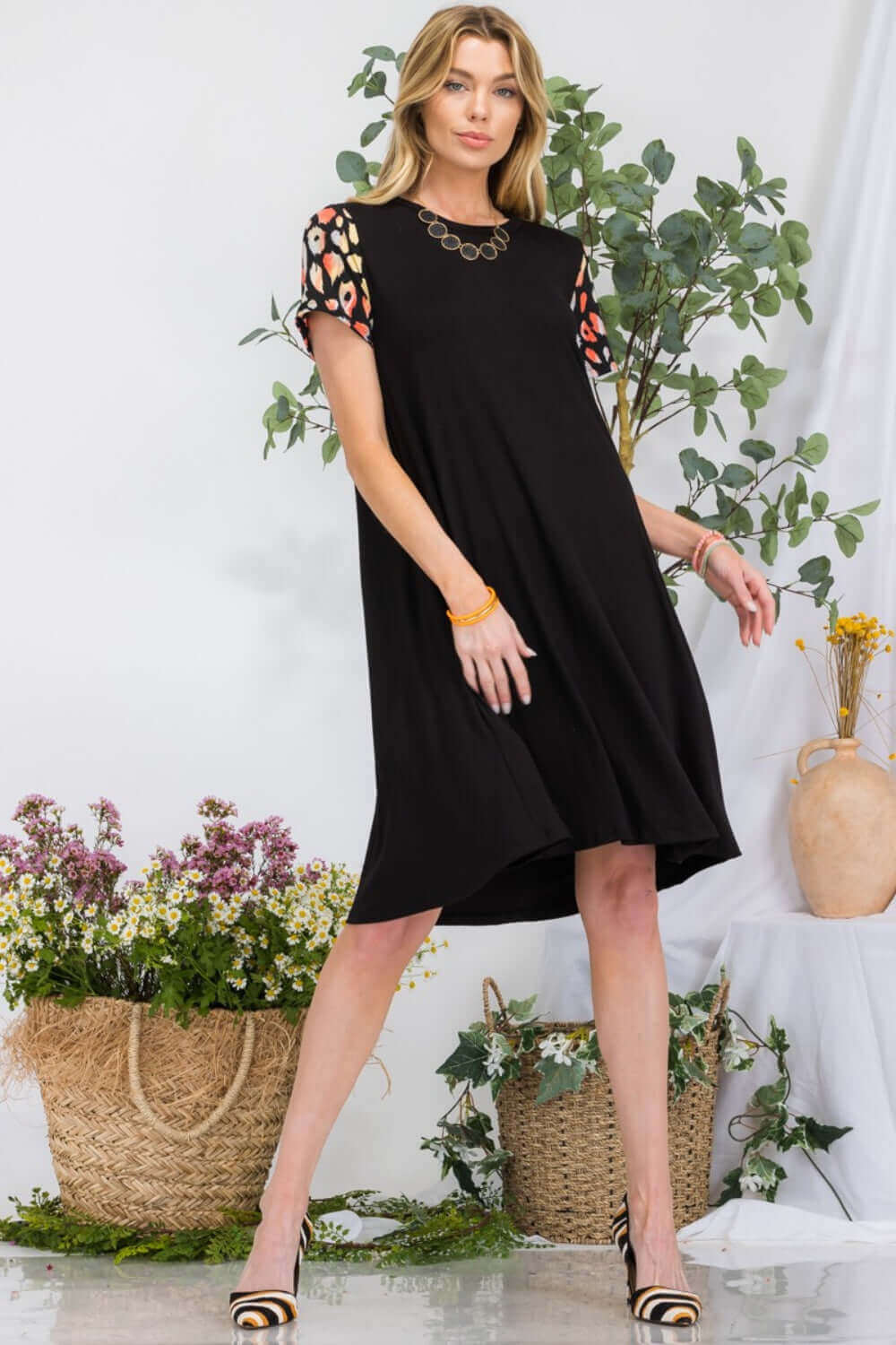 CELESTE Full Size Leopard Short Sleeve Dress with Pockets at Bella Road