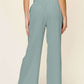 DOUBLE TAKE Full Size Texture Smocked Waist Wide Leg Pants at Bella Road