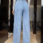 Back view of Bella Road Wide Leg High Waist Jeans with Pockets in light wash denim.