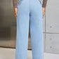 Back view of Bella Road wide leg jeans with pockets, stylish and practical denim fashion