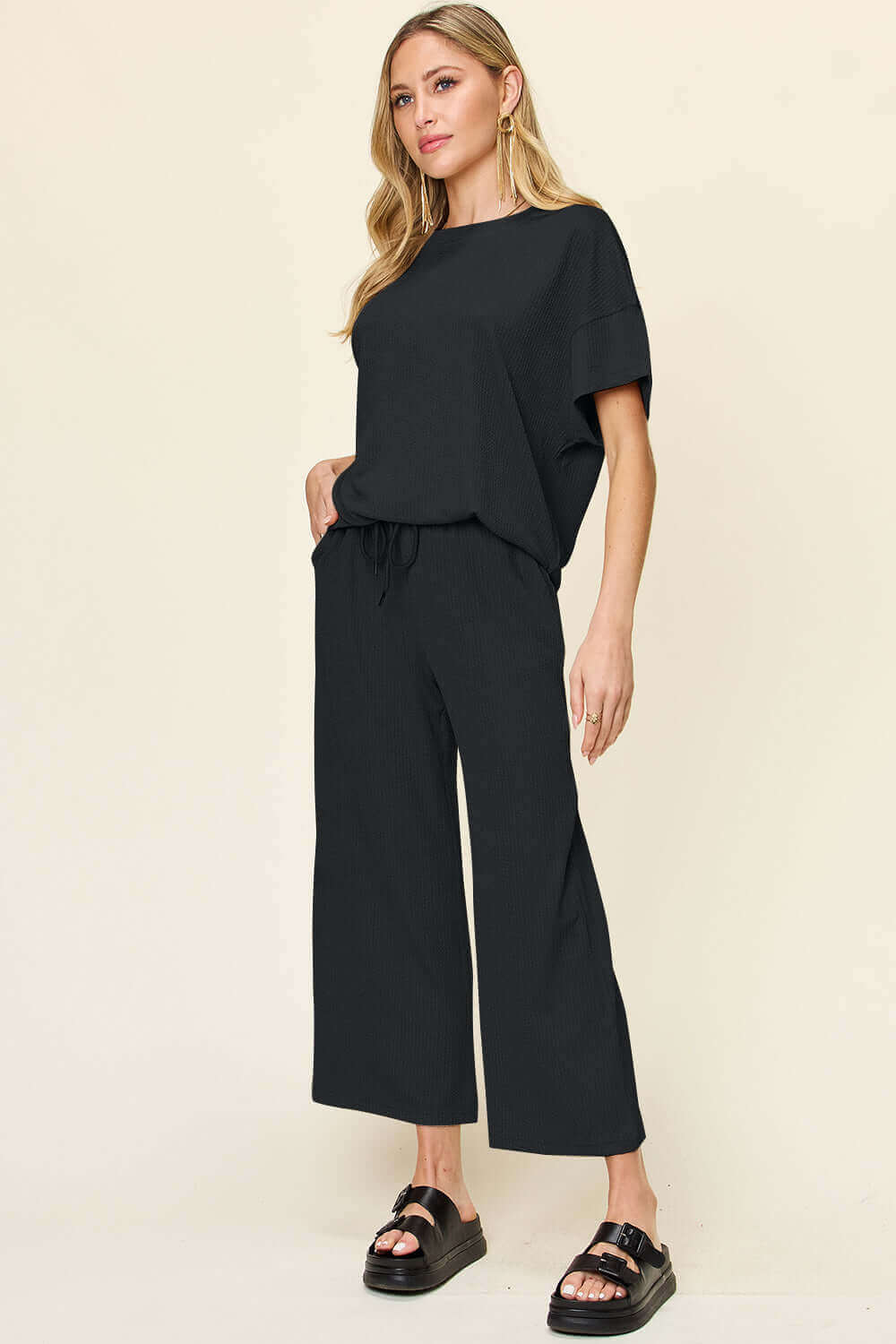 DOUBLE TAKE Full Size Texture Round Neck Short Sleeve T-Shirt and Wide Leg Pants at Bella Road