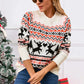 Woman wearing angel wings reindeer sweater with festive holiday design, perfect for cozy and playful winter style.