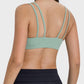 Stylish back view of Millennia Scoop Neck Double Strap Active Cami in mint green, showcasing its double strap design.