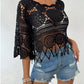 Black openwork round neck cover-up by Bella Road Swim, styled with denim shorts for a chic beach look.