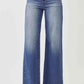 Elevate your style with high waist raw hem wide leg Risen Jeans for a trendy and chic wardrobe staple.