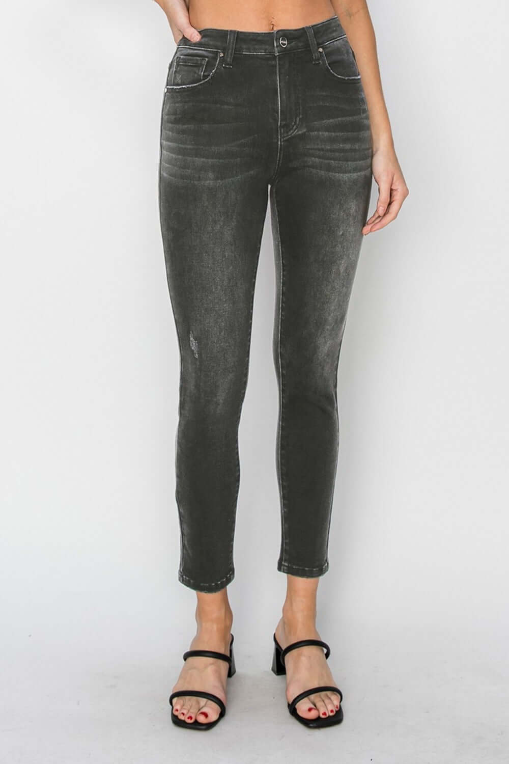 RISEN Full Size High Rise Ankle Skinny Jeans in black, showcasing high-waisted design, slim fit, and stretchy fabric ideal for versatile styling.