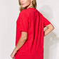 Woman wearing a red graphic round neck short sleeve t-shirt with slightly stretchy material, shown from the back.