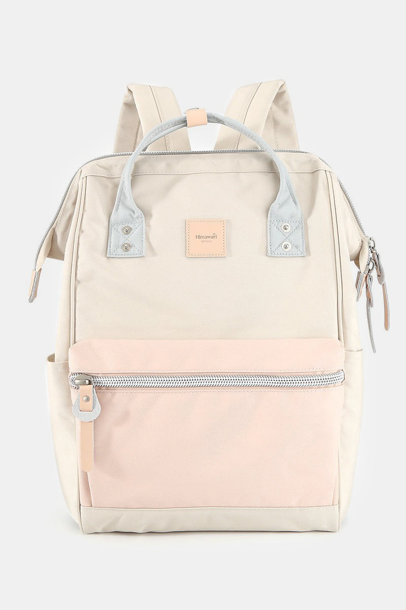 Water-resistant canvas backpack with side pockets in beige and pink, perfect for stylish adventures and safe storage on the go.