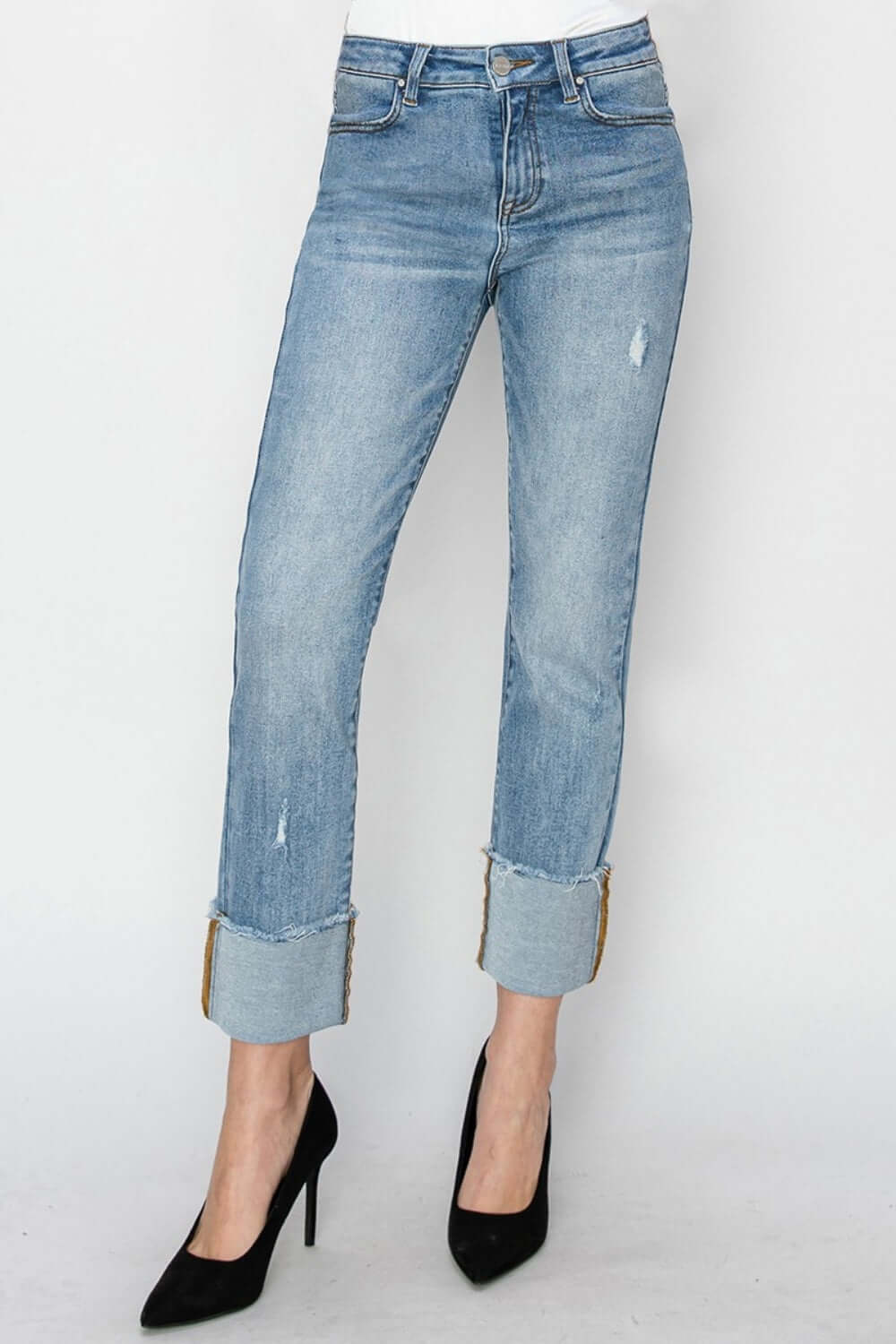 High rise cuffed slim straight Risen Jeans styled with black heels for a trendy look