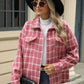 Woman wearing Bella Road Plaid Collared Neck Long Sleeve Jacket, black hat, sunglasses, and holding a black quilted purse.