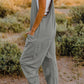 DOUBLE TAKE Full Size V-Neck Sleeveless Jumpsuit with Pockets at Bella Road