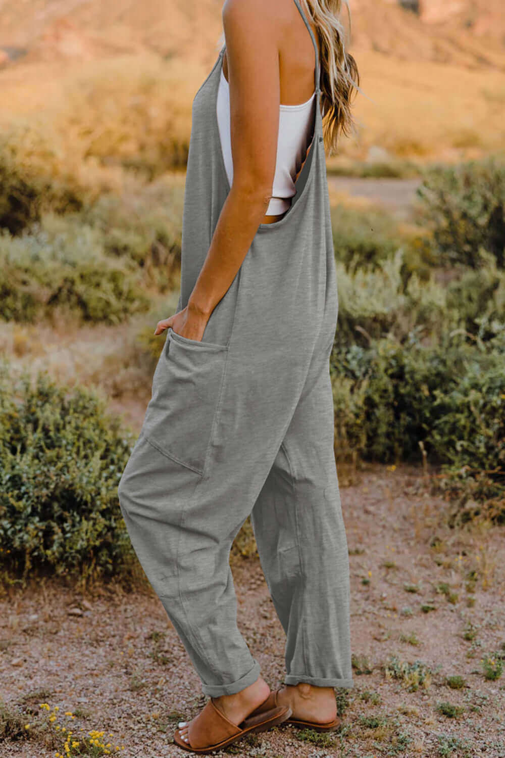 DOUBLE TAKE Full Size V-Neck Sleeveless Jumpsuit with Pockets at Bella Road