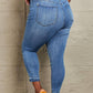 Woman wearing Janavie full-size high waisted pull-on skinny jeans with release hem back view. Judy Blue Jeans.