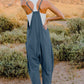 DOUBLE TAKE Full Size V-Neck Sleeveless Jumpsuit with Pockets at Bella Road