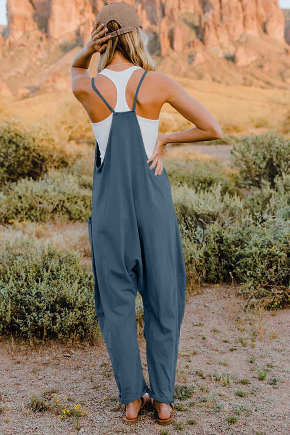 DOUBLE TAKE Full Size V-Neck Sleeveless Jumpsuit with Pockets at Bella Road