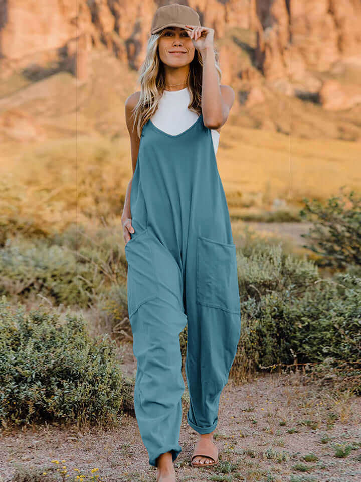 DOUBLE TAKE Full Size V-Neck Sleeveless Jumpsuit with Pockets at Bella Road