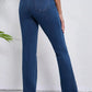 Women's straight jeans with pockets, moderate stretch, comfortable fit, back view, blue denim, perfect for any women's style.