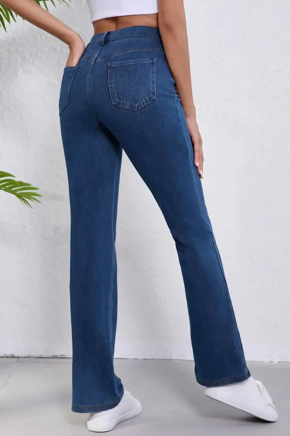 Women's straight jeans with pockets, moderate stretch, comfortable fit, back view, blue denim, perfect for any women's style.