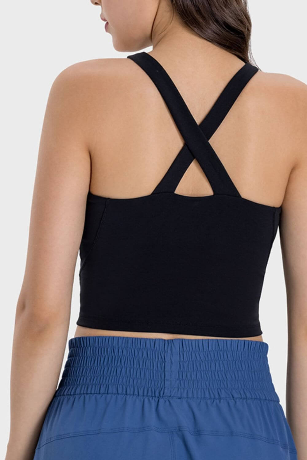 Back view of Millennia Crisscross Grecian Neck Active Cami in black, showcasing its stylish crisscross design.