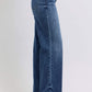 Side view of Judy Blue mid-rise jeans with raw hem, showcasing a stylish and casual denim look.