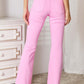 High Rise Bootcut Jeans in pink, featuring a flattering high-waist design and elegant bootcut style, perfect for versatile wardrobe options.