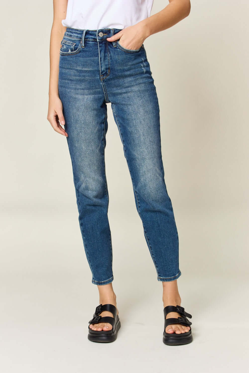 Tummy Control High Waist Slim Jeans by Judy Blue Jeans modeled, highlighting slimming effect and high waist design for a flattering silhouette