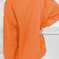 Bella Road Game Day Round Neck Long Sleeve Sweatshirt in orange shown from the back