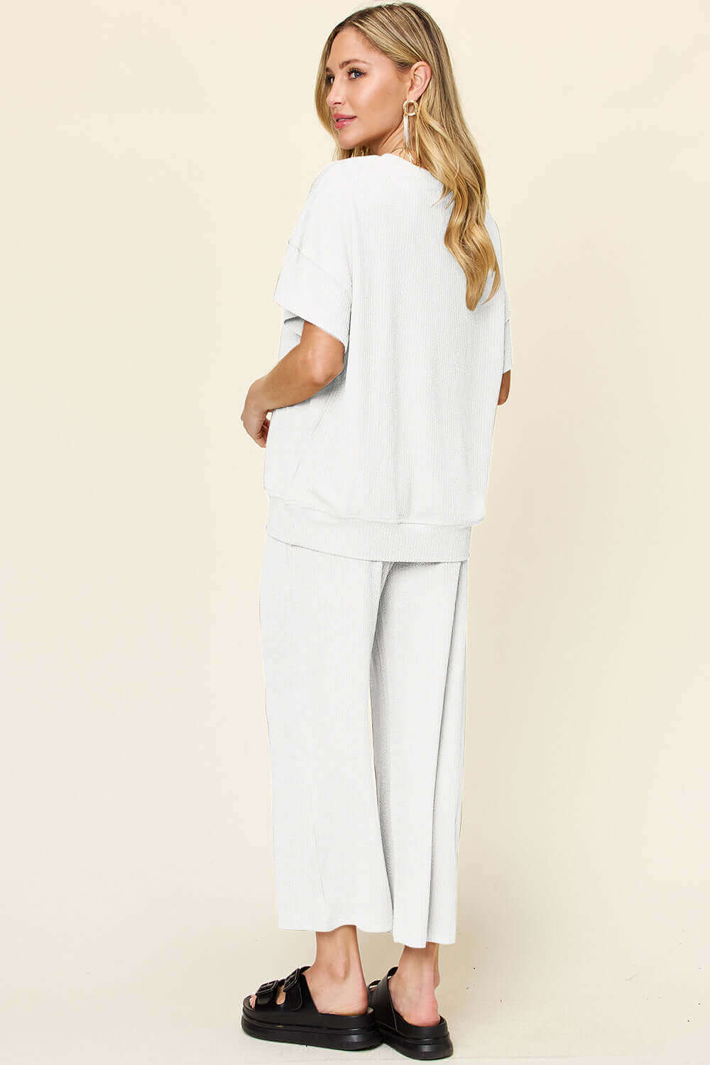 DOUBLE TAKE Full Size Texture Round Neck Short Sleeve T-Shirt and Wide Leg Pants at Bella Road