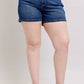 Judy Blue plus size denim shorts with double button waistband, perfect for stylish and comfortable summer looks.