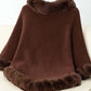 Cozy brown poncho with fuzzy trim, showcasing a stylish back design perfect for chilly days.