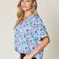 DOUBLE TAKE Full Size Printed V-Neck Short Sleeve Blouse at Bella Road