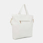 Nicole Lee USA studded large tote bag in white vegan leather with dual top handles, gold zipper detail, and optional shoulder strap.