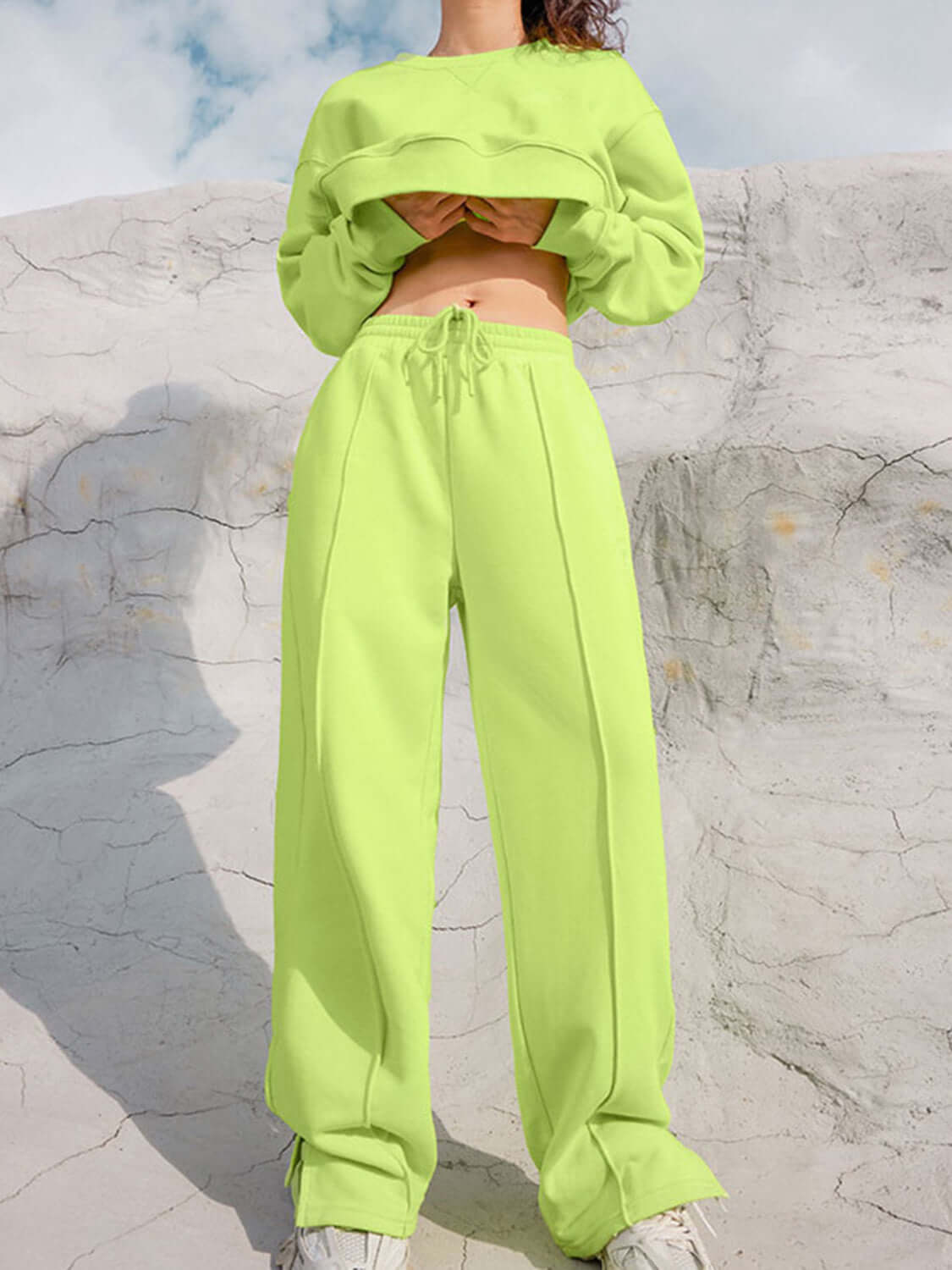 Lime Bella Road Set with round neck top and elastic waist pants, perfect for a trendy and comfortable look in any setting.